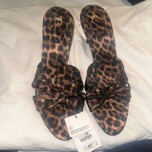 Zara cheetah shoes
Runs small